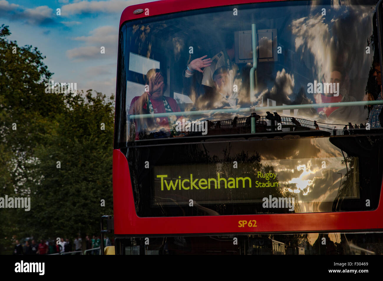 Richmond, London, UK. 26th Sep, 2015. Welsh fans on a bus to Twickenham Stadium for the England v Wales Rugby World Cup match Credit: On Sight Photographic/Alamy Live News Stock Photo