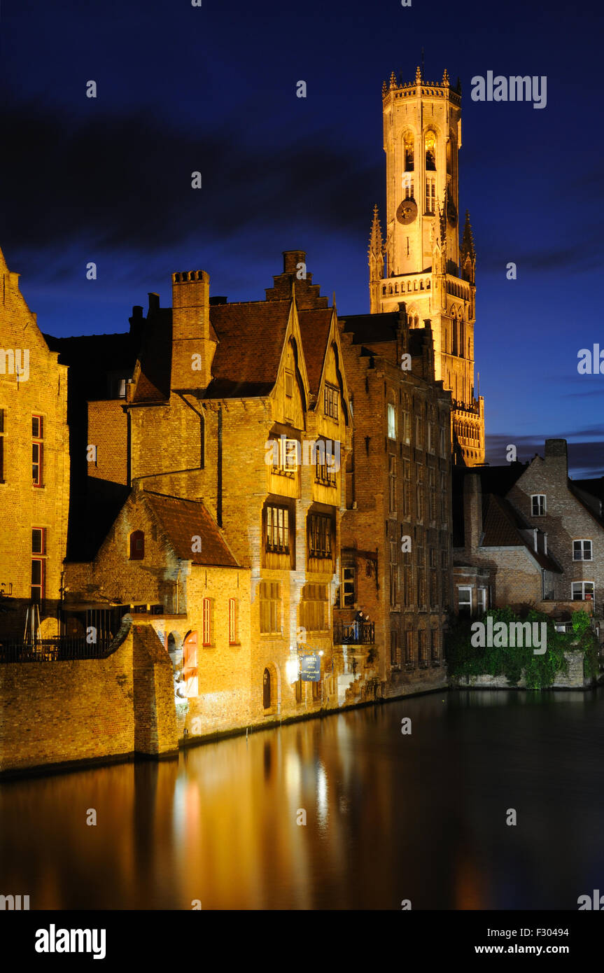 Evening view of the Belfry from the Rozenhoedkaai in Bruges, West-Vlaanderen, Belgium Stock Photo