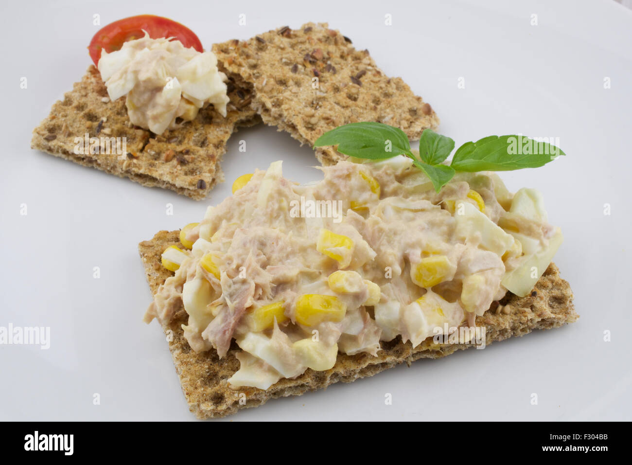 Multigrain crisp bread and tuna salad Stock Photo