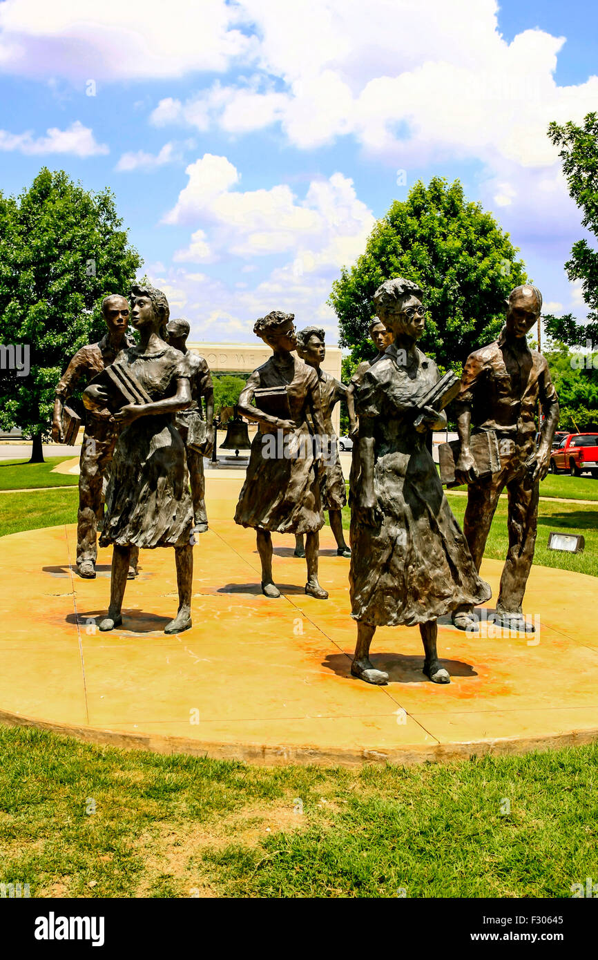 Statues of the Little Rock Nine stand just below the governor's office window at the Arkansas State Capital Building Stock Photo