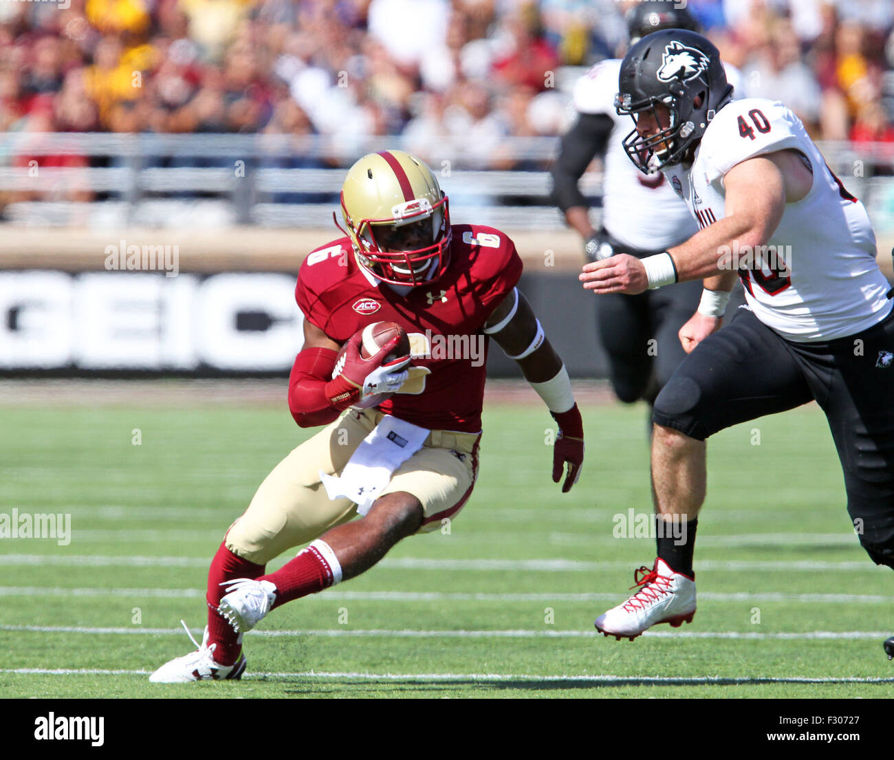 September 26, 2015; Chestnut Hill, MA, USA; Boston College Eagles wide receiver Sherman Alston (6) is pursued by Northern Illinois Huskies linebacker Sean Folliard (40) during the second half of the NCAA football game between the Boston College Eagles and Northern Illinois Huskies at Alumni Stadium. Boston College defeated Northern Illinois 17-14. Anthony Nesmith/Cal Sport Media Stock Photo