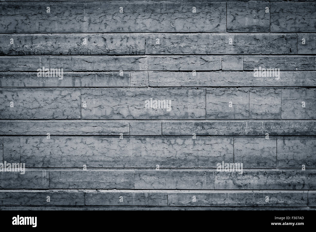 Gray stone wall closeup background photo texture Stock Photo - Alamy