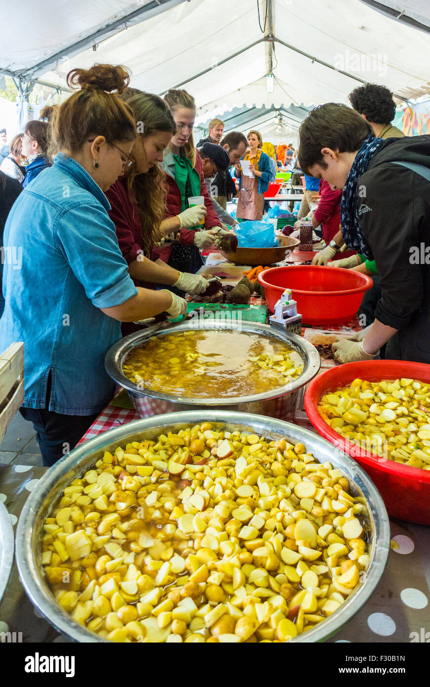 Paris, France. French Teens Preparing Meals in Kitchen, Street Food, at