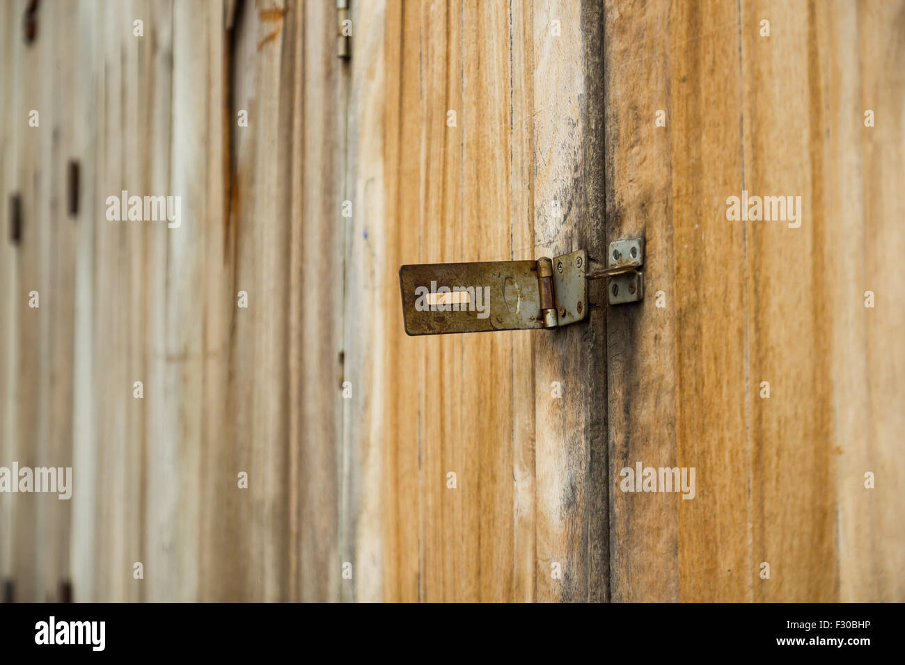Wooden door and latch background Stock Photo - Alamy