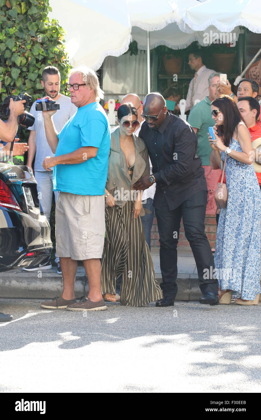 Kourtney Kardashian Leaving The Ivy Restaurant In Beverly Hills Featuring Kourtney Kardashian Corey Gamble Where Los Angeles California United States When 26 Jul 15 Stock Photo Alamy