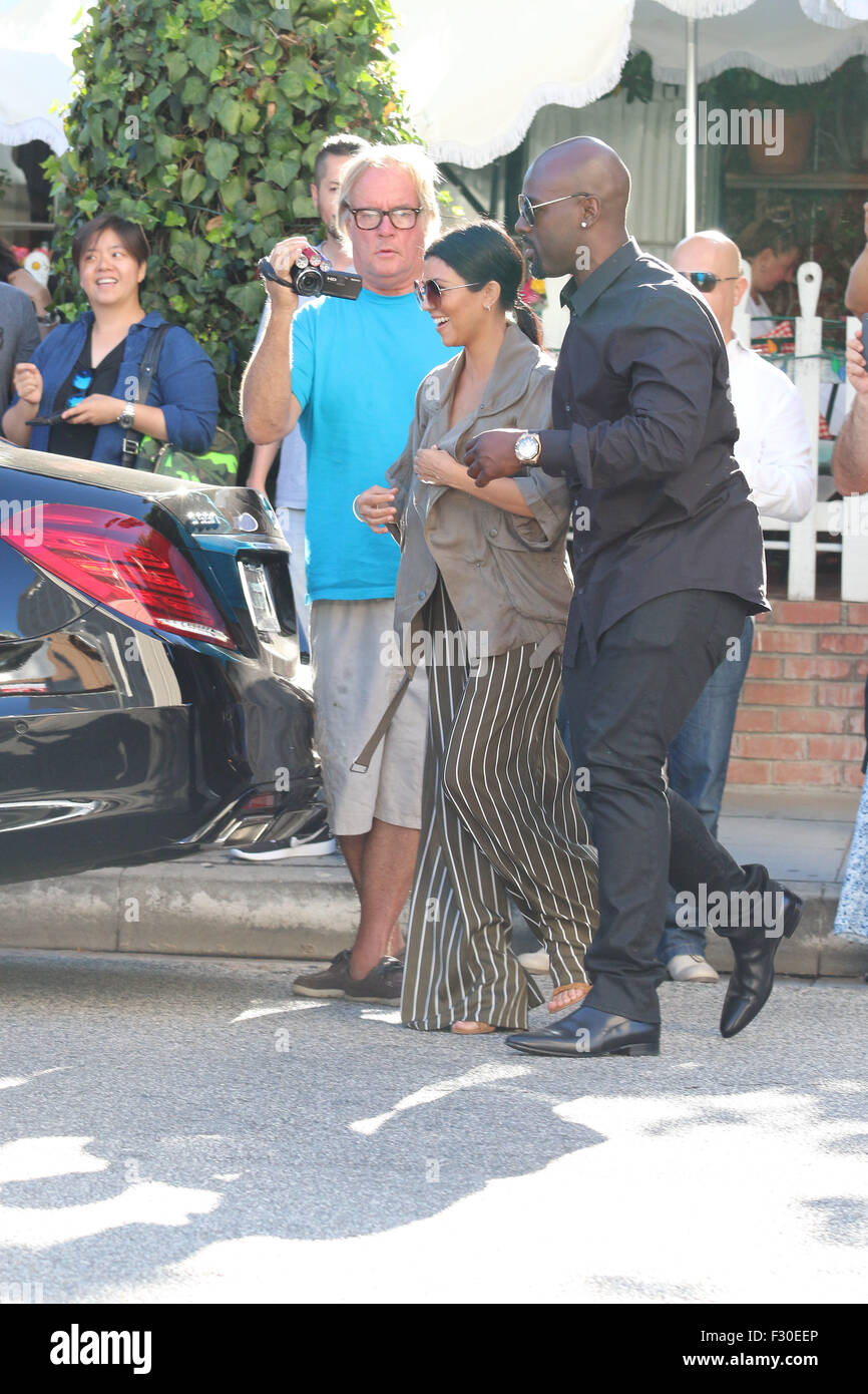 Kourtney Kardashian Leaving The Ivy Restaurant In Beverly Hills Featuring Kourtney Kardashian Corey Gamble Where Los Angeles California United States When 26 Jul 15 Stock Photo Alamy