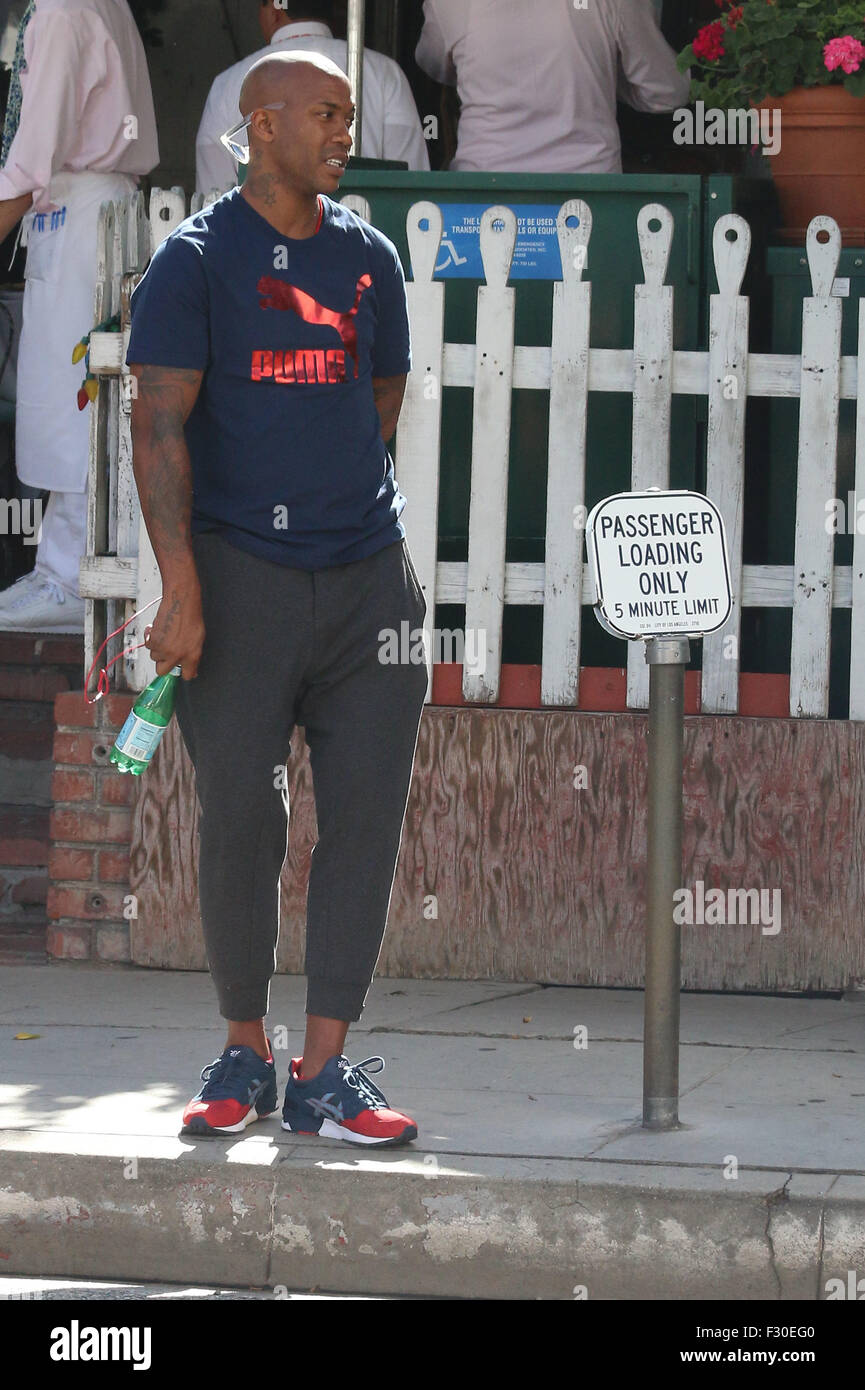 Former NBA player Stephon Marbury leaving The Ivy restaurant in Beverly