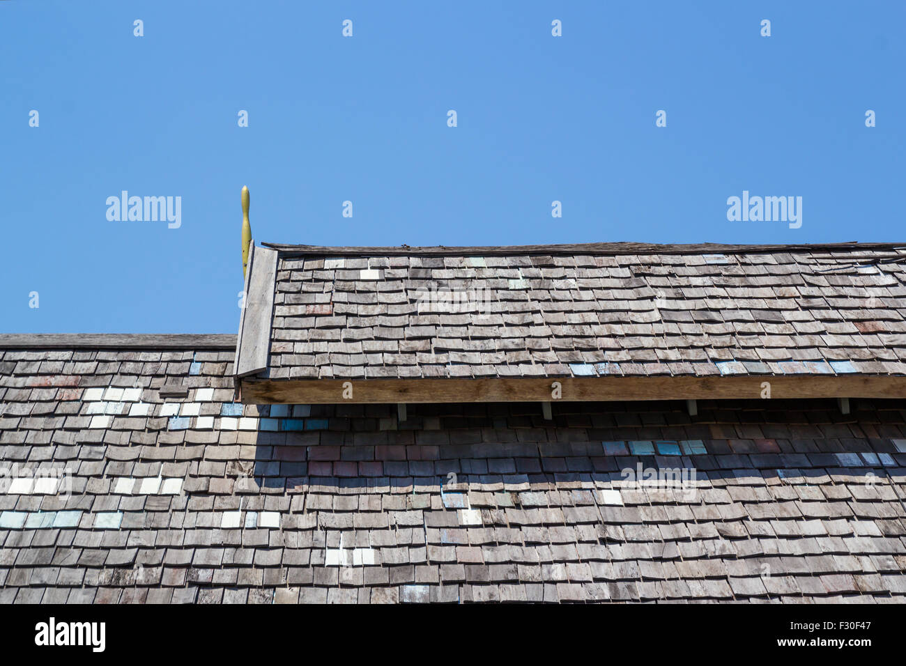 Wood roofing pattern detail on blue sky background Stock Photo