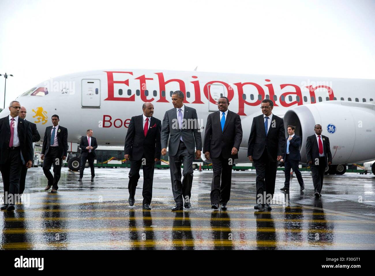 U.S. President Barack Obama walks with Ethiopian Prime Minister Hailemariam Desalegn Boshe (center) and President Mulatu Teshome (right) after viewing an Ethiopian Airlines Boeing 787 Dreamliner at Bole International Airport July 27, 2015 in Addis Ababa, Ethiopia. Stock Photo