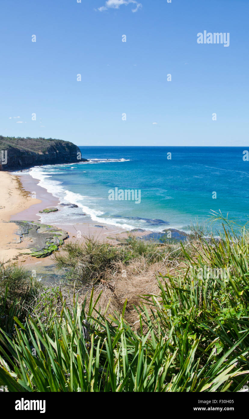 Turimetta Beach,Sydney suburb of Warriewood NSW Australia.An unsafe beach for swimming - strong currents and submerged rocks. Stock Photo