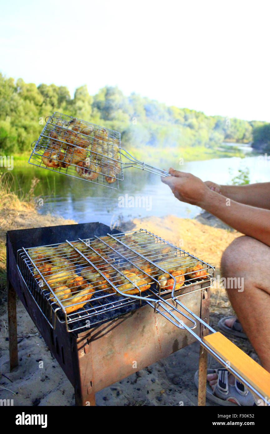 appetizing barbecue from hen's meat cooking in the nature Stock Photo