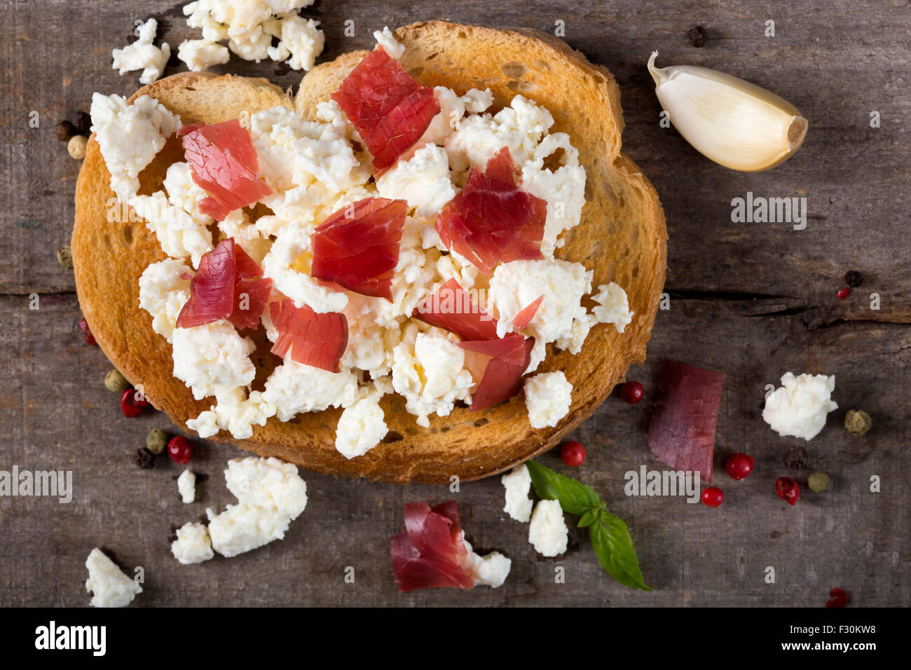 Toasted bread slice with smoked beef meat and cheese Stock Photo