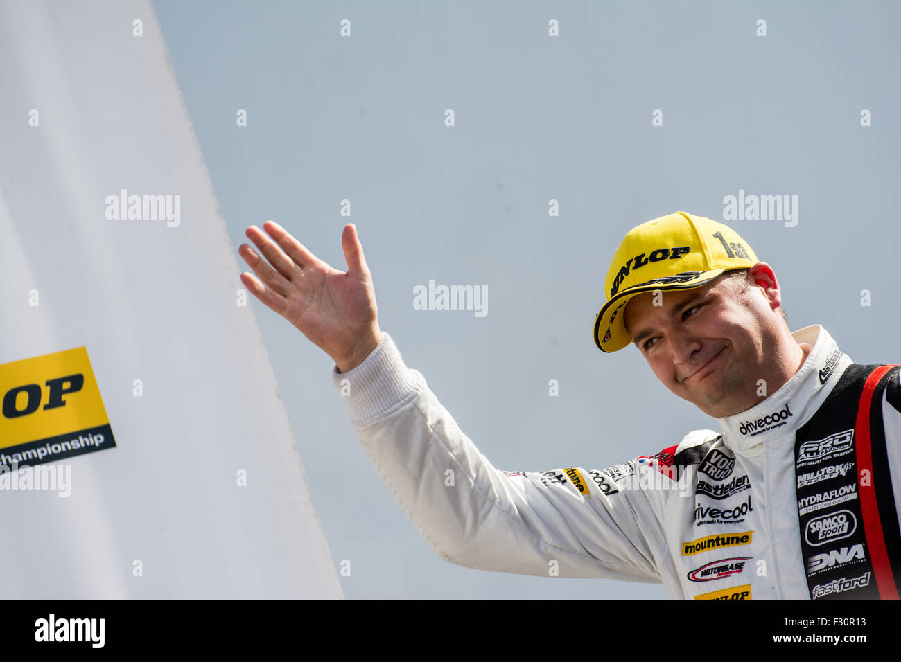 Silverstone, Northamptonshire, UK. 27th Sep, 2015. Mat Jackson and Motorbase Performance celebrates First place finish of the Dunlop MSA British Touring Car Championship at Silverstone Circuit on September 27, 2015 in Silverstone, United Kingdom (Photo by Gergo Toth Photo / Alamy Live News) Credit:  Gergo Toth/Alamy Live News Stock Photo