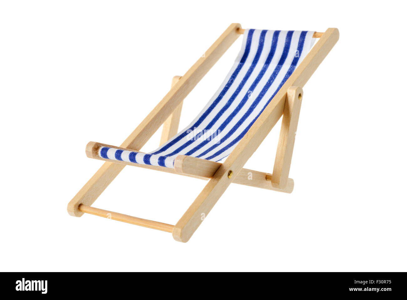 Isolated objects: wooden blue striped deck chair, isolated on white background Stock Photo