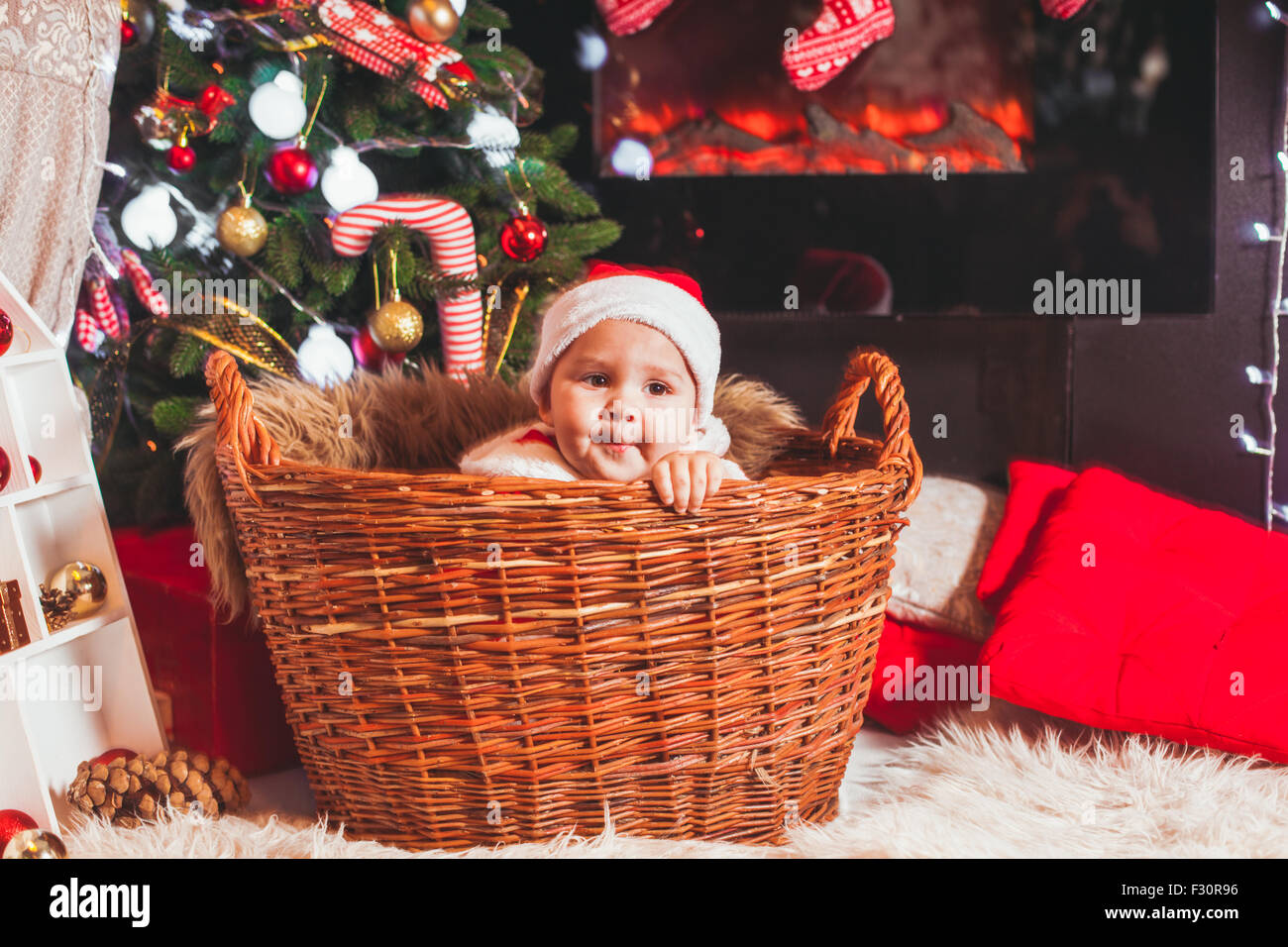 Baby in Santa costume Stock Photo Alamy