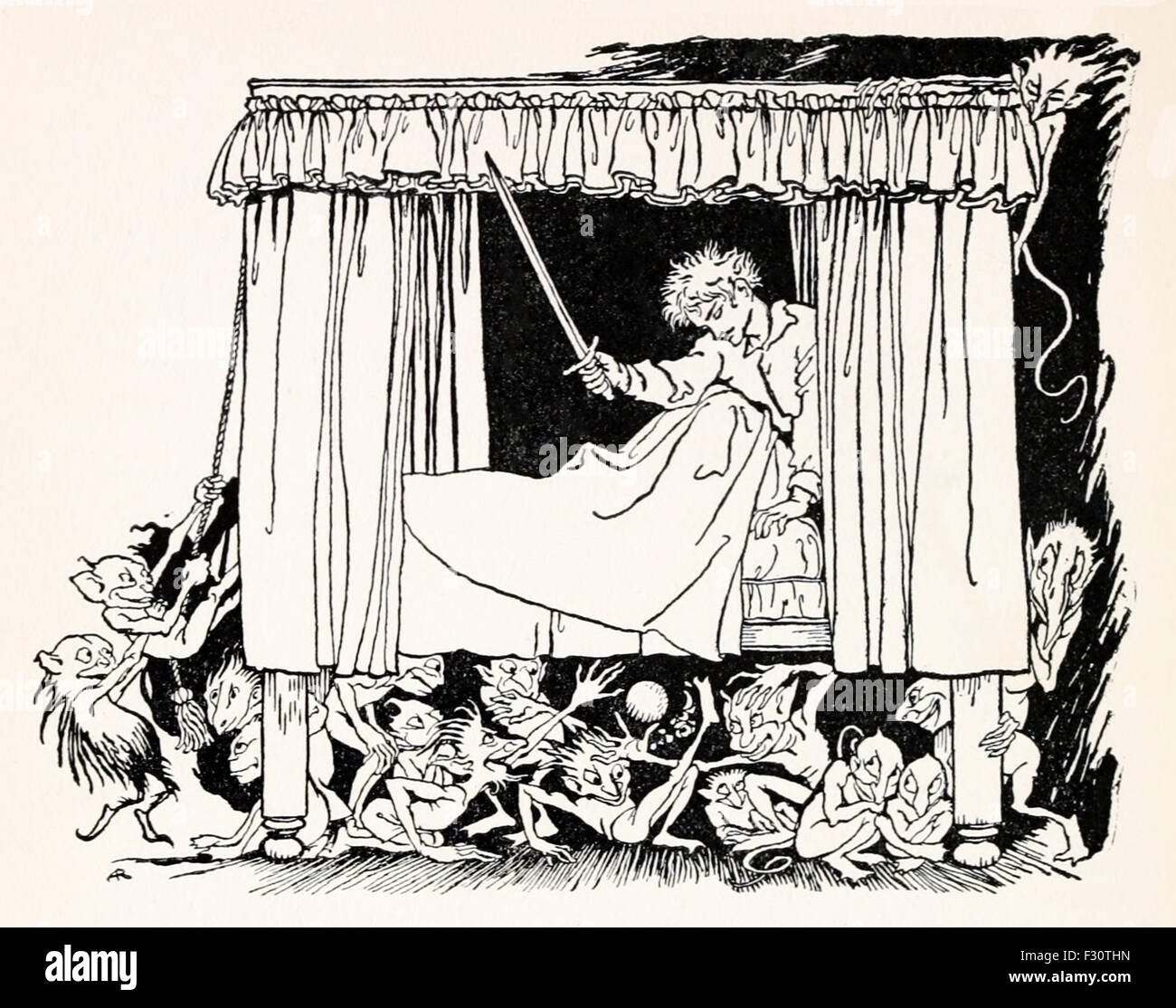 The Bogles causing mischief under the bed, from 'The Golden Ball' in 'English Fairy Tales', illustration by Arthur Rackham (1867-1939). See description for more information. Stock Photo