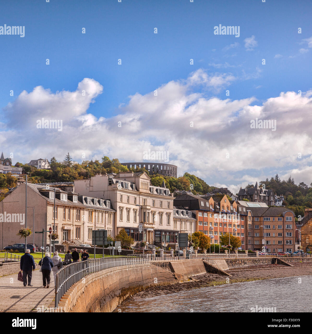Houses and apartments on the promenade at Oban, with McCaigs Tower on the skyline, Oban, Argyll