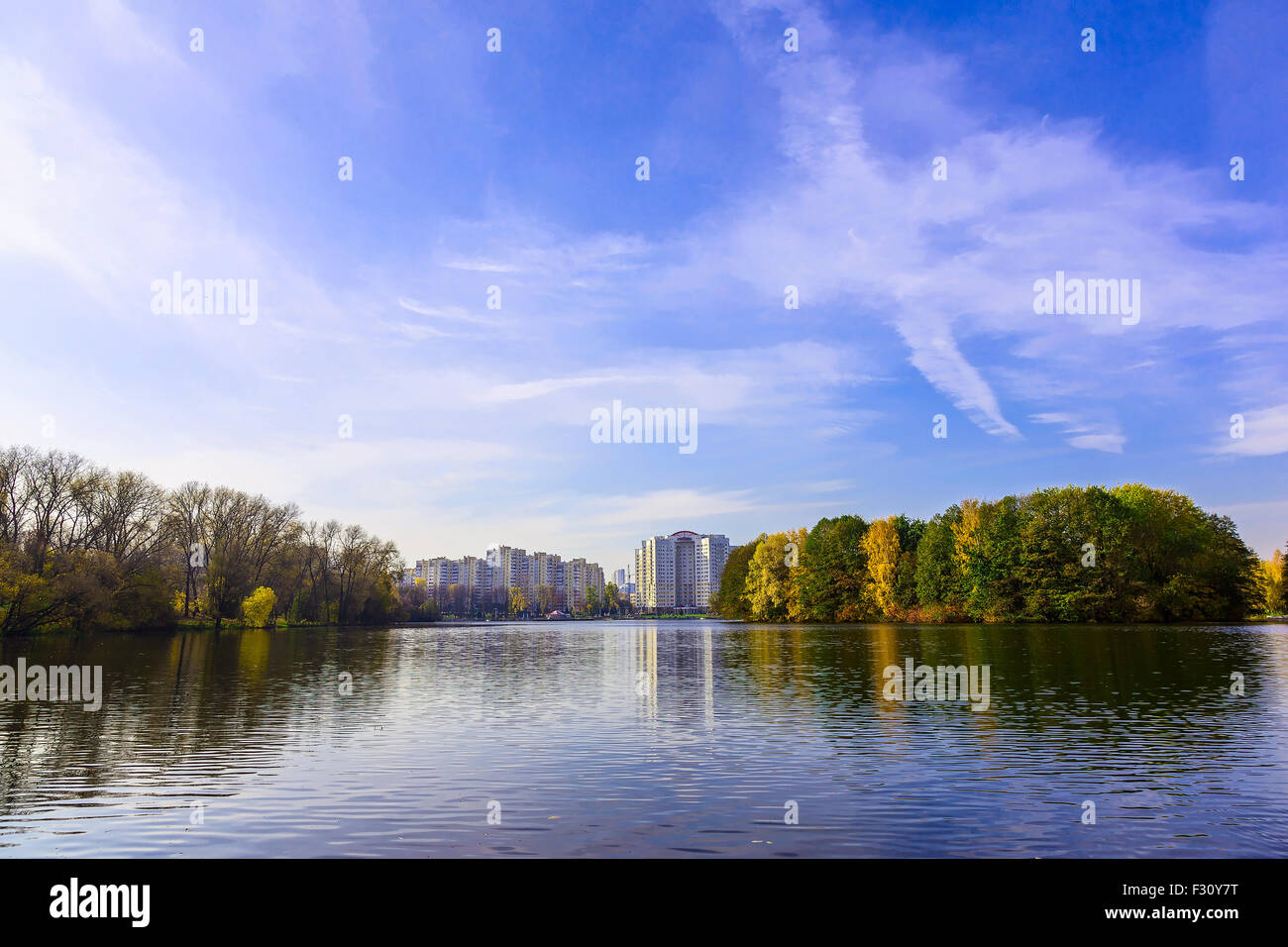 Autumn Landscape with Building Between Colourful Trees at Lake and ...