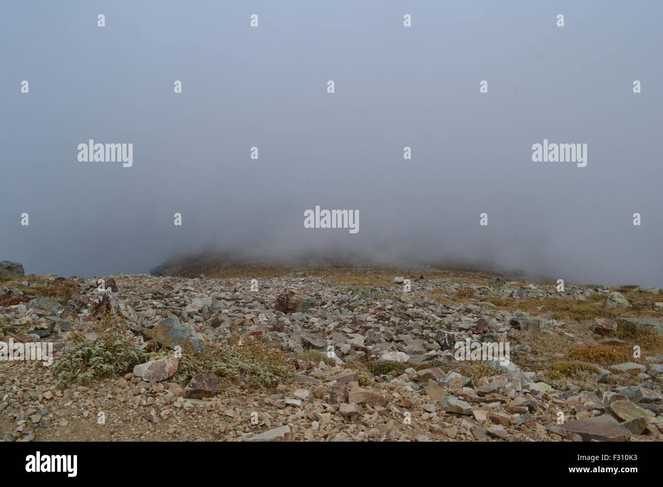 Foggy view on a mountain Stock Photo - Alamy