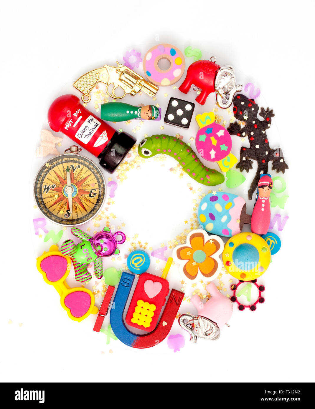 the letter O made from lots of old small toys Stock Photo Alamy