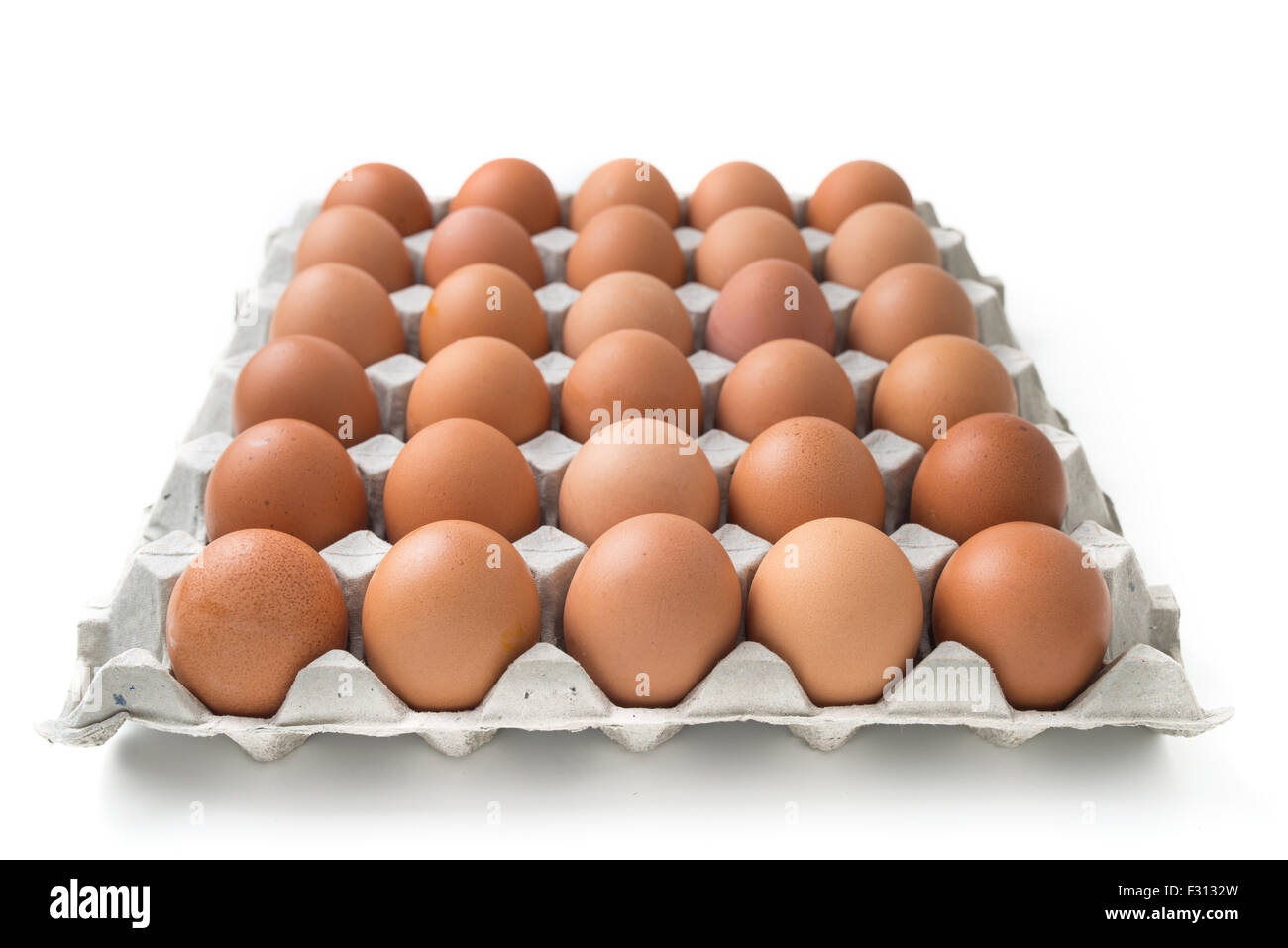 eggs in carton package isolated on white Stock Photo