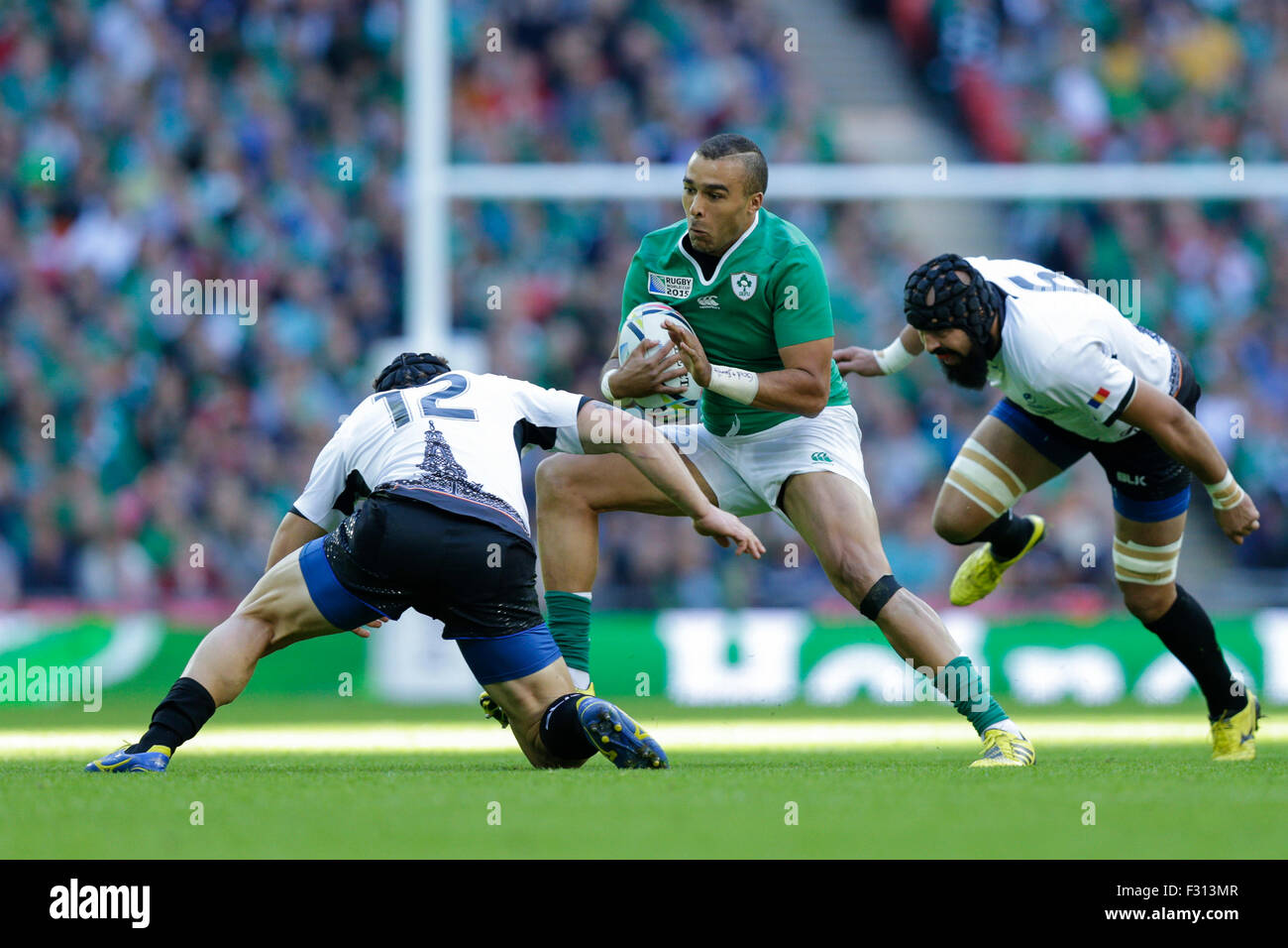 London, UK. 27th Sep, 2015. Rugby World Cup. Ireland versus Romania. Ireland fullback Simon Zebo prepares to ride the tackle of Romania centre Csaba Gal Credit:  Action Plus Sports/Alamy Live News Stock Photo