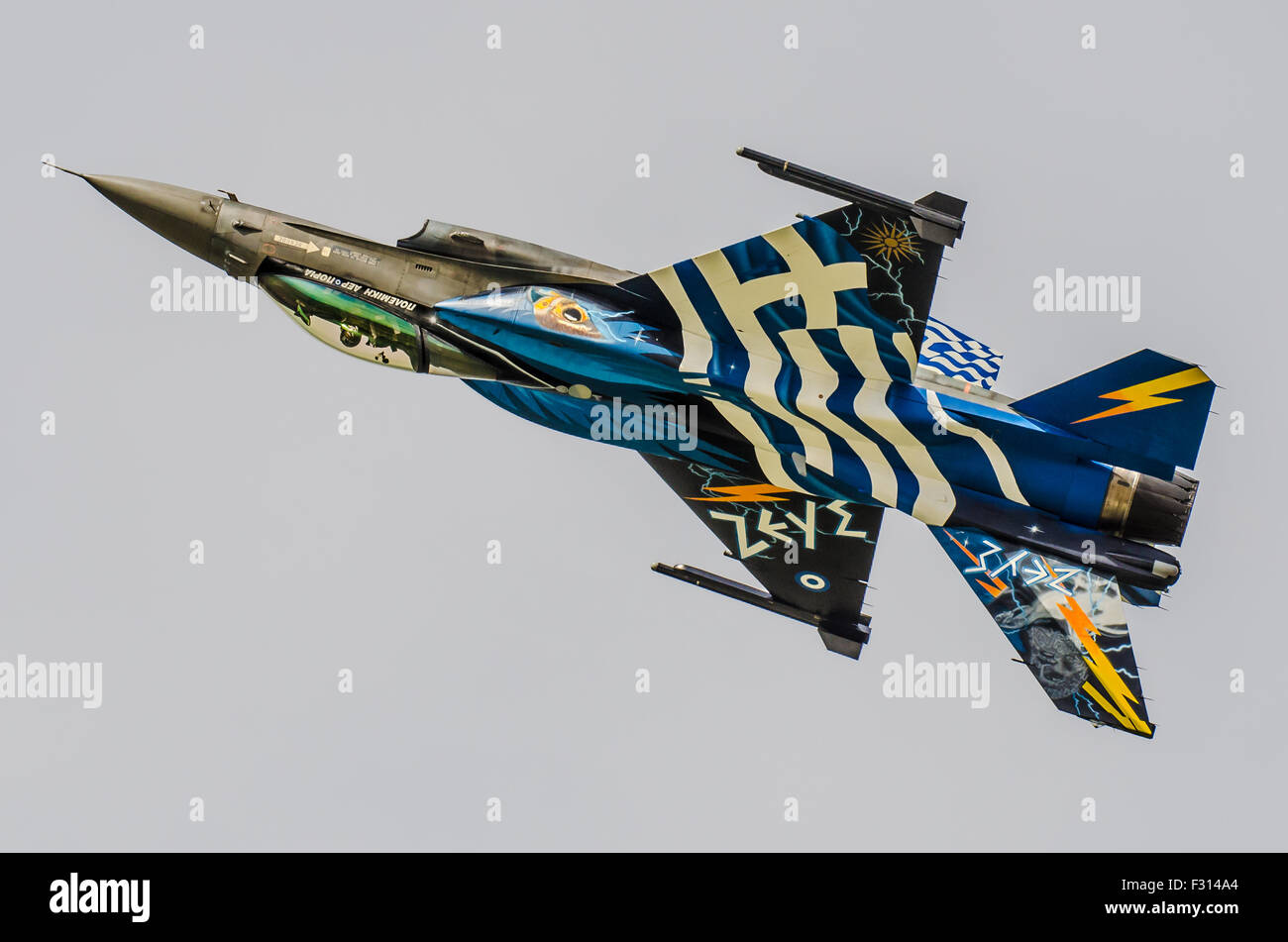 Greek General Dynamics F-16 fighter jet plane flying display aircraft with special paint scheme and known as 'Zeus'. Hellenic Air Force HAF display Stock Photo