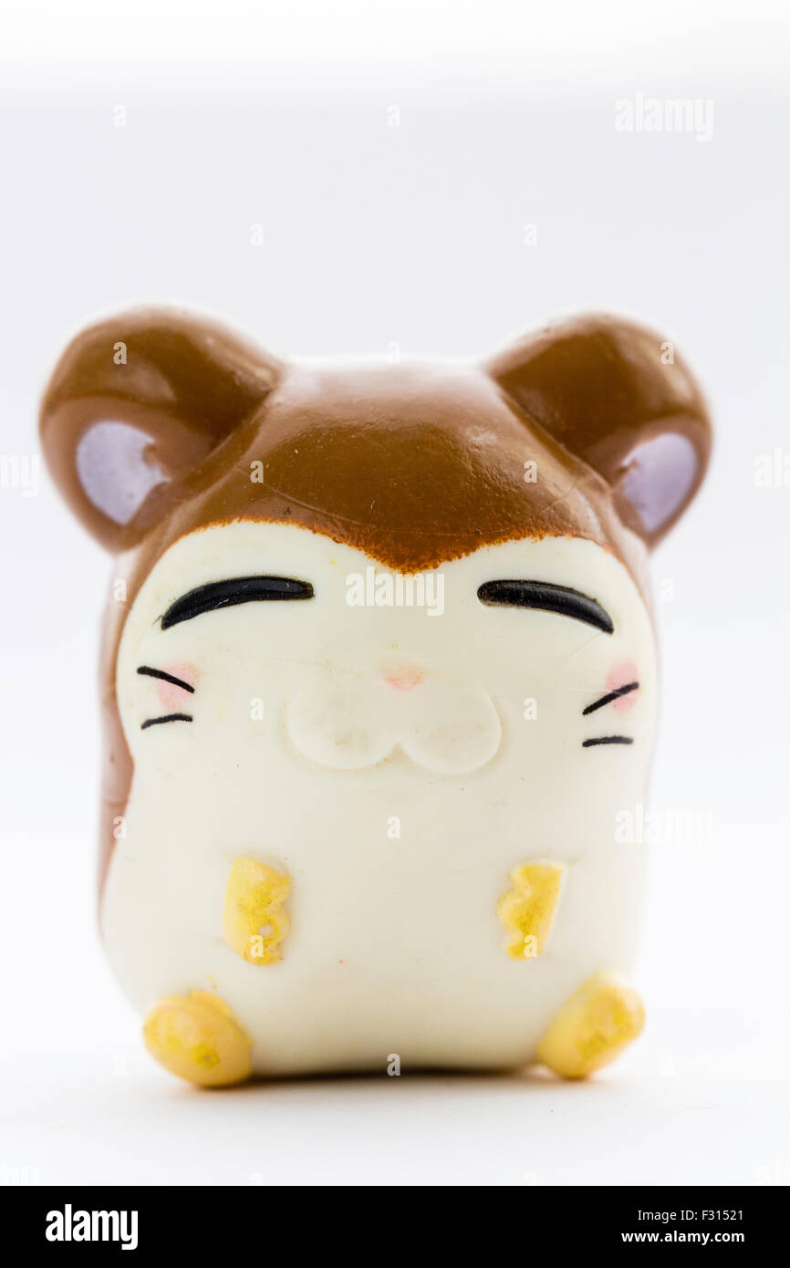 Japanese plastic Anime Hamtaro hamster cartoon character, Maxwell, from the Ham-Ham gang. Anime figure against white background. Stock Photo