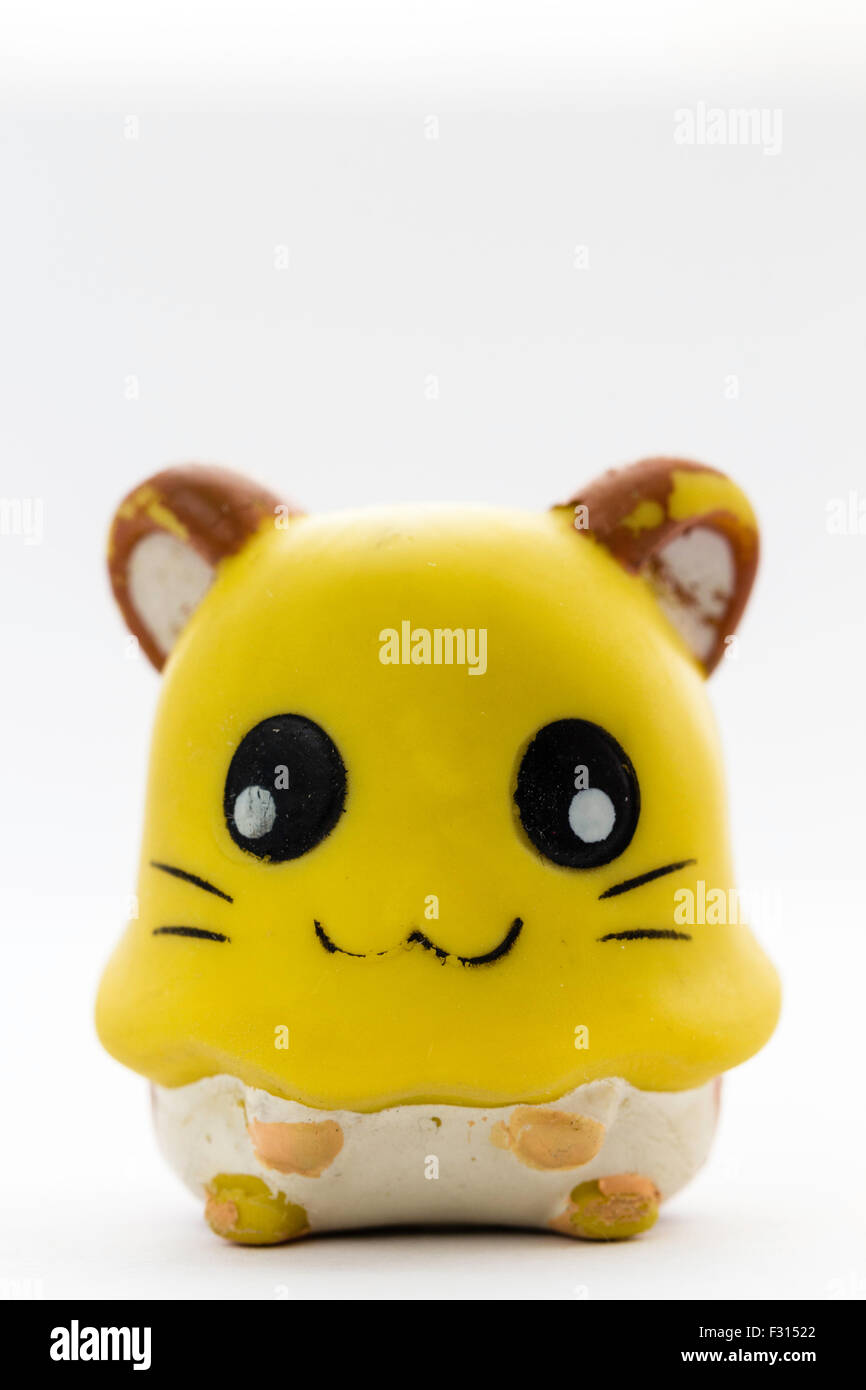 Japanese plastic popular Hamtaro cartoon hamster character, Penelope, from the Ham-Ham gang, hamster. Anime figure against white background. Stock Photo
