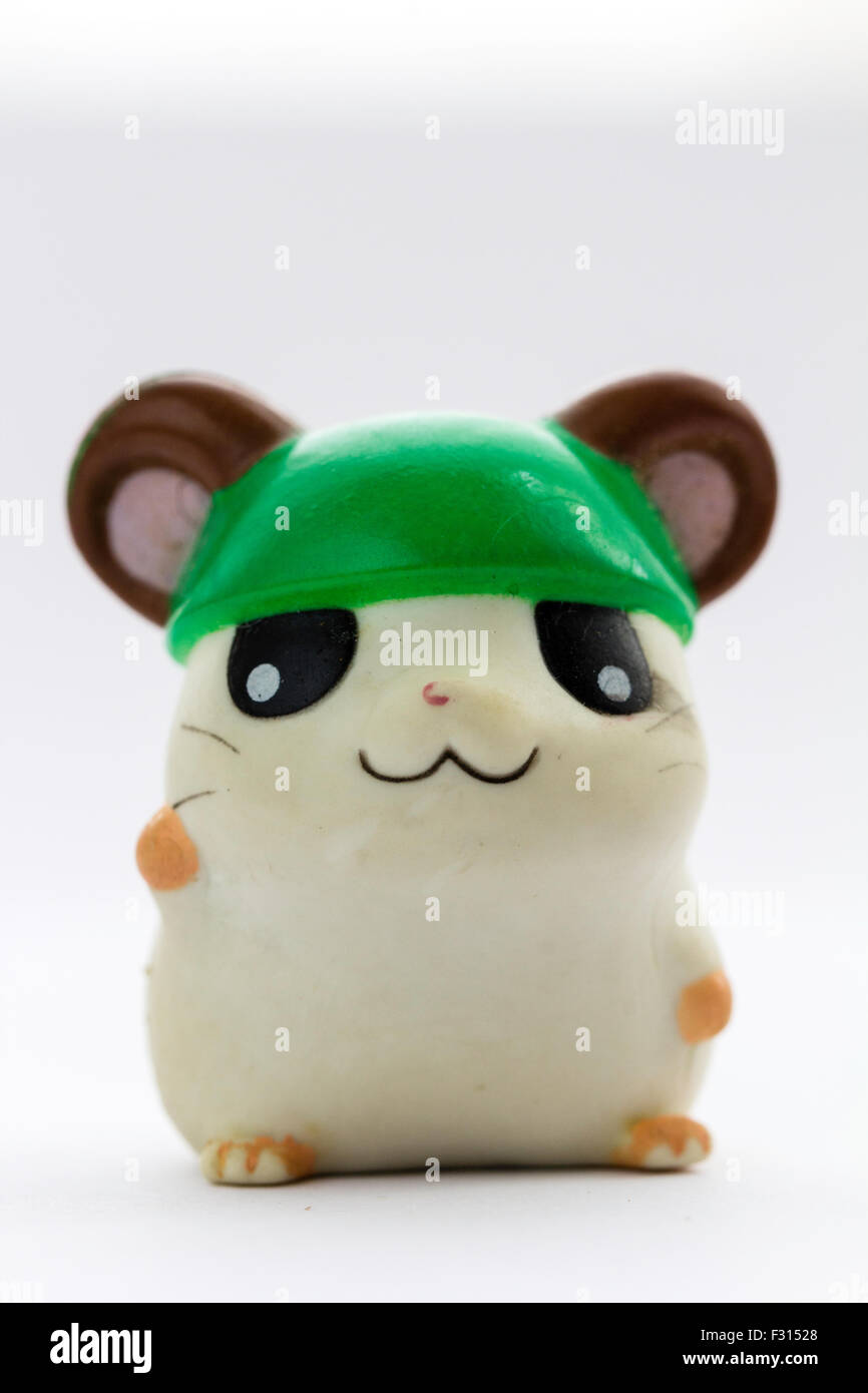 Japanese plastic Hamtaro hamster cartoon character, Cappy, from the Ham-Ham gang, hamster. Anime figure against white background. Stock Photo