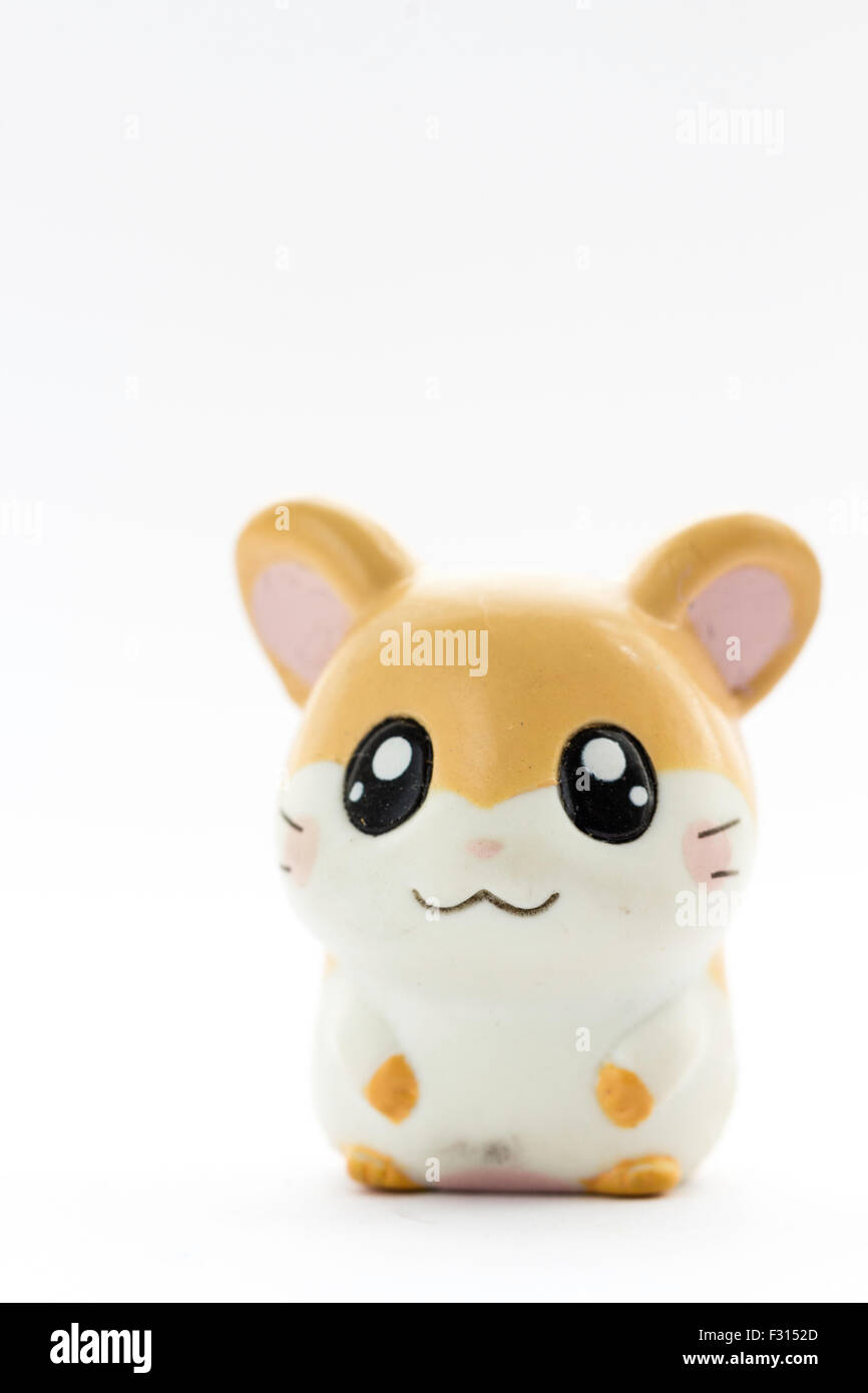 Japanese plastic Hamtaro hamster cartoon character, Pashimina, from the Ham-Ham gang, hamster. Anime figure against white background. Stock Photo
