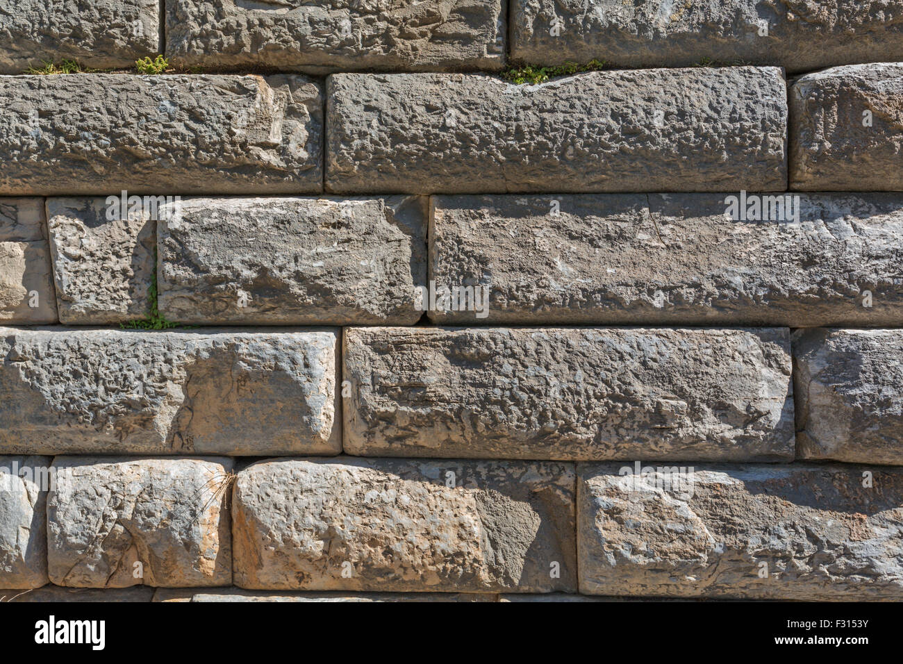 Natural ancient brick and stone wall texture Stock Photo - Alamy