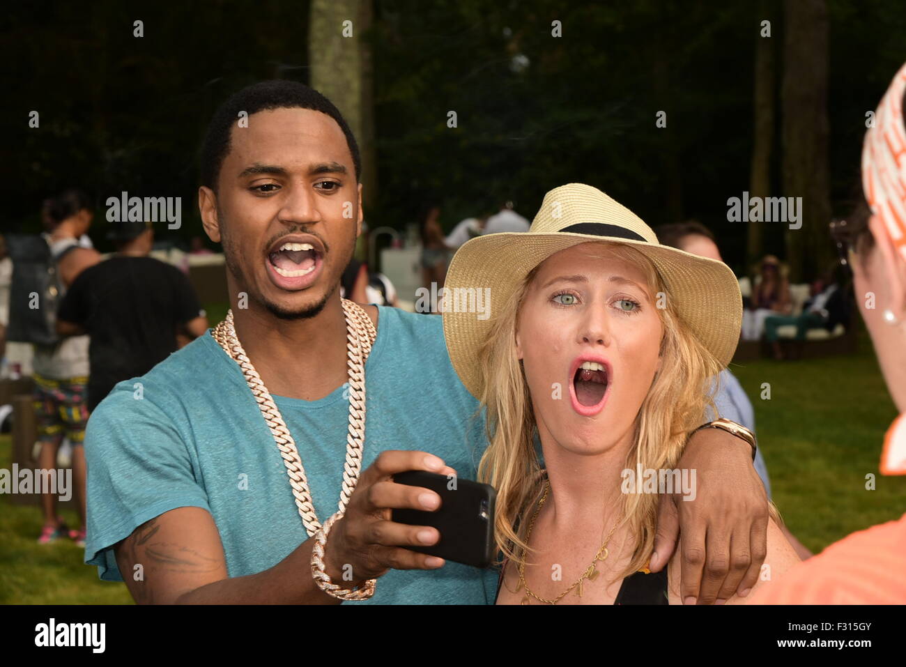 Trey Songz and J.R. filming a video for 'That's My Best Friend' at a private estate in East Hampton  Featuring: Trey Songz, Sophie Watson Where: East Hampton, New York, United States When: 26 Jul 2015 Stock Photo