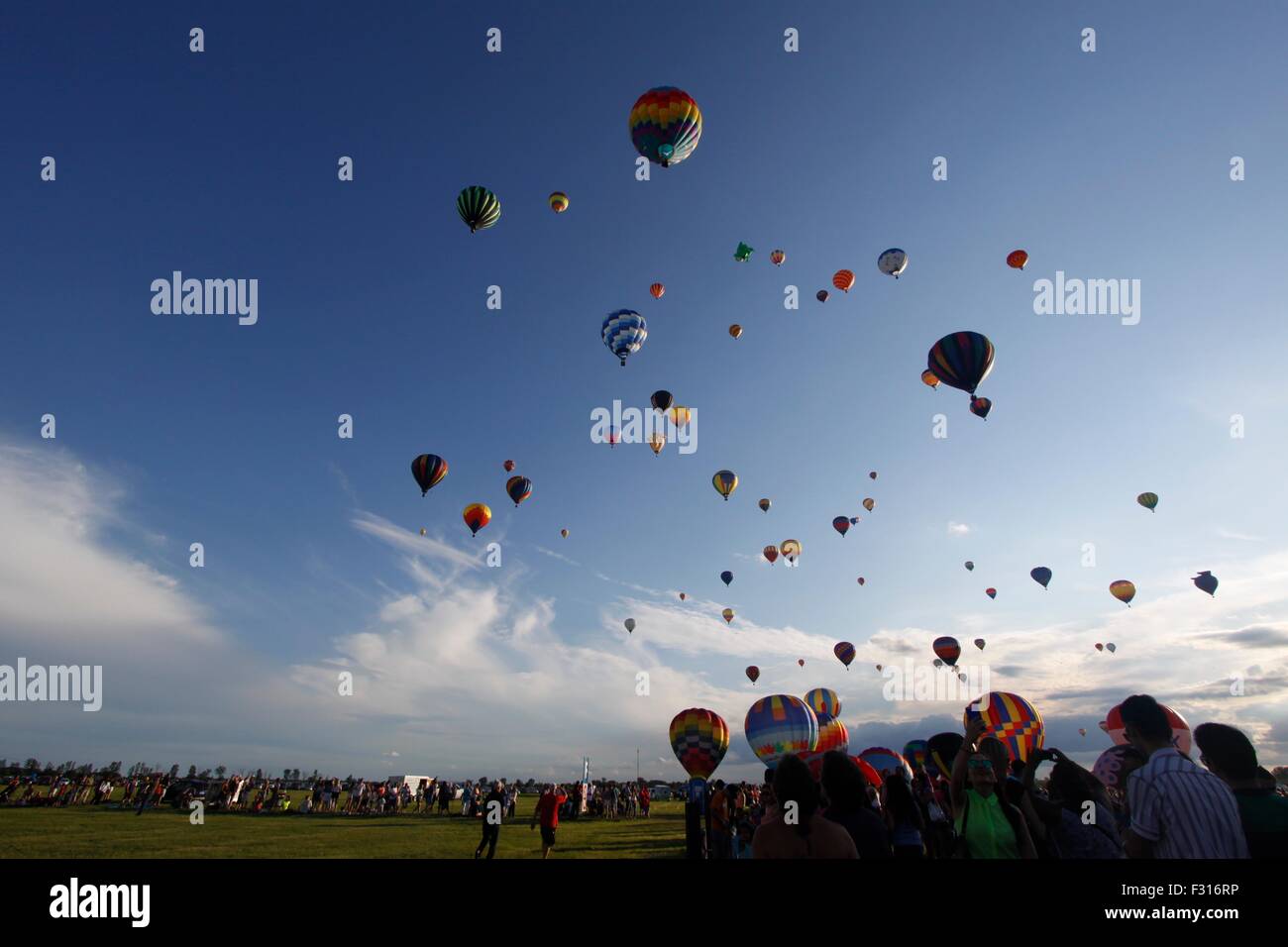 Hot air balloons drifting up at the International Balloon Festival of