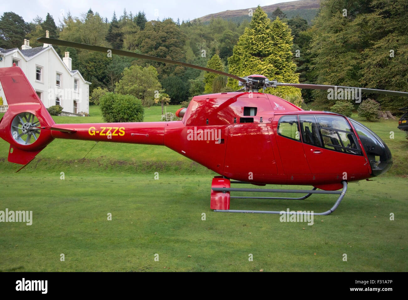 bright-red-eurocopter-ec120-b-colibri-helicopter-callsign-g-zzzs-stock