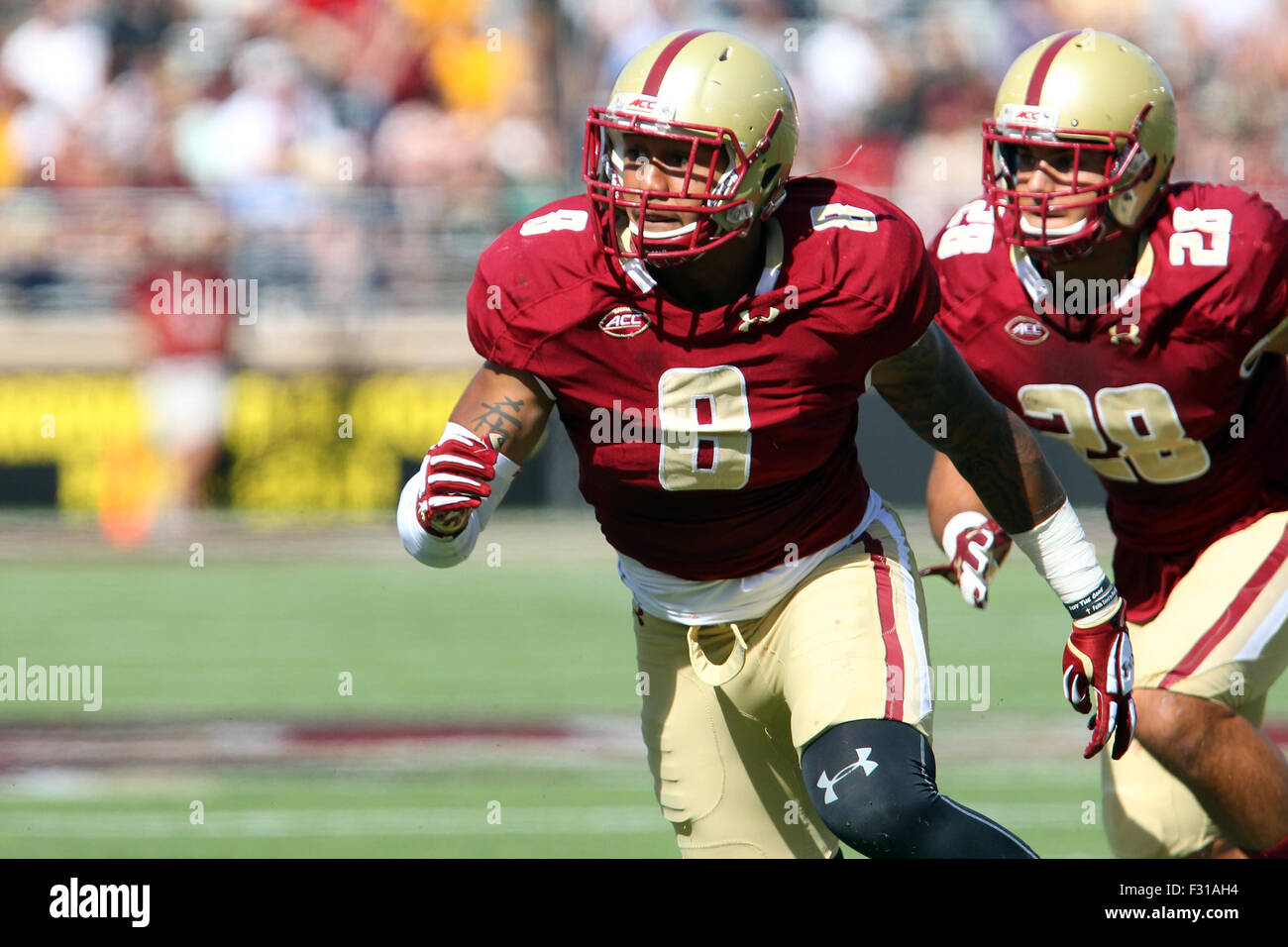 September 26, 2015; Chestnut Hill, MA, USA; Boston College Eagles defensive lineman Harold Landry (8) and Boston College Eagles linebacker Matt Milano (28) in action during the NCAA football game between the Boston College Eagles and Northern Illinois Huskies at Alumni Stadium. Boston College defeated Northern Illinois 17-14. Anthony Nesmith/Cal Sport Media Stock Photo