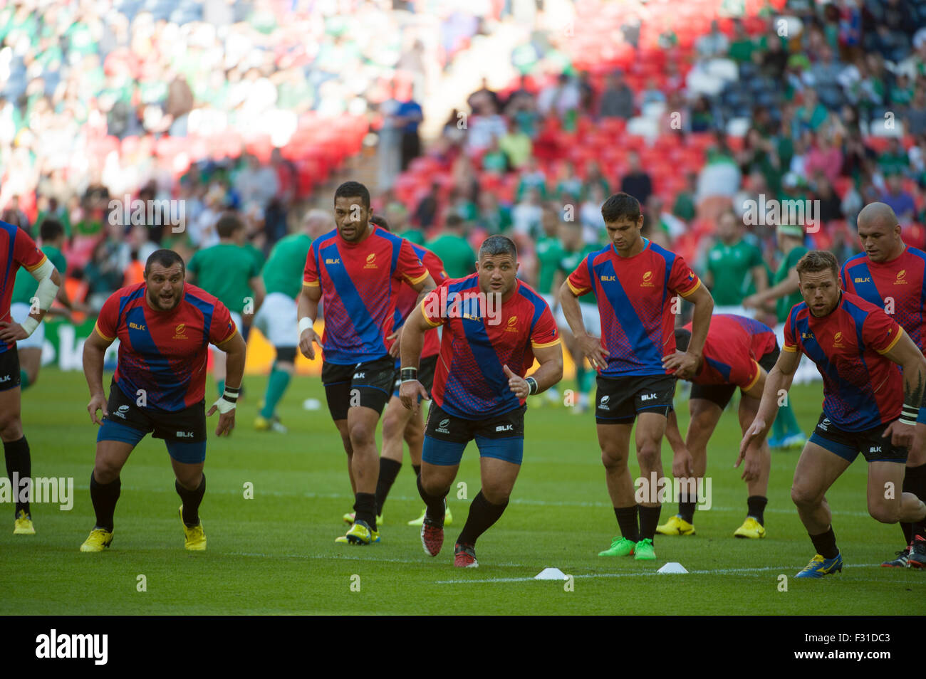 Wembley Stadium, London, UK. 27th September, 2015. Ireland v Romania in the Pool D match of the Rugby World Cup 2015. The Romanian squad warm-up before the match. Credit:  sportsimages/Alamy Live News Stock Photo