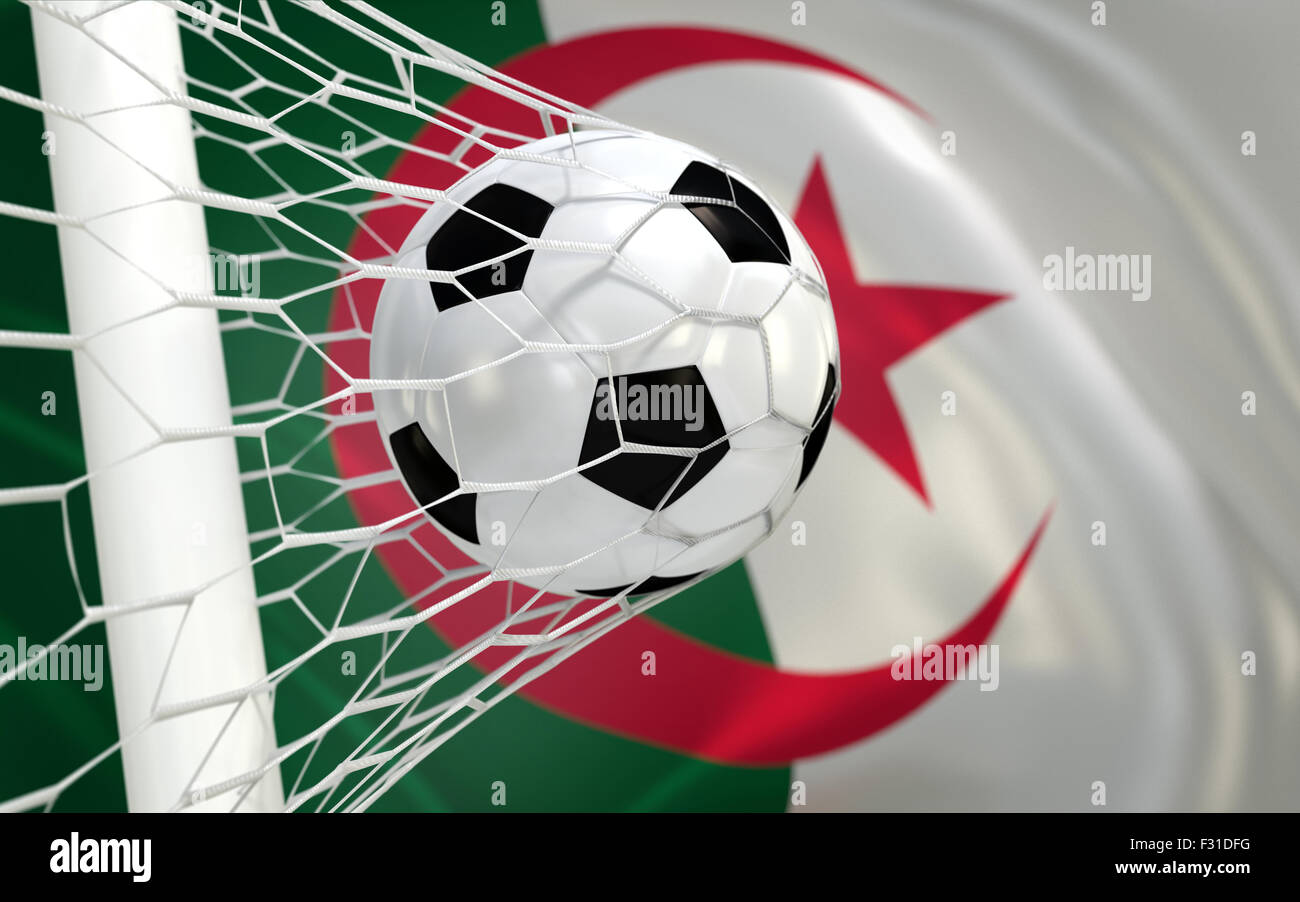 Algeria flag and soccer ball, football in goal net Stock Photo - Alamy