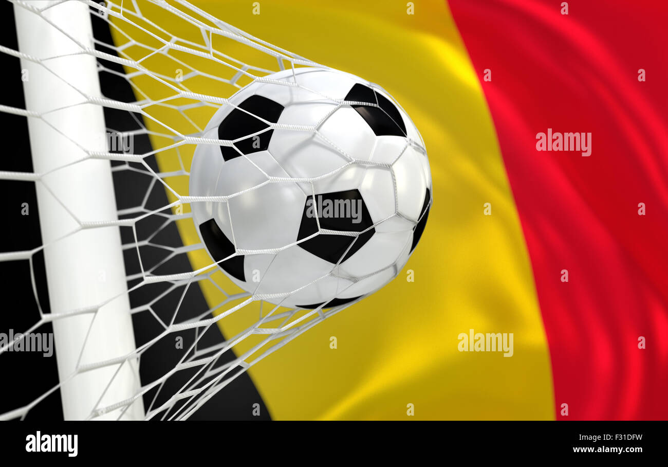 Belgium flag and soccer ball, football in goal net Stock Photo - Alamy