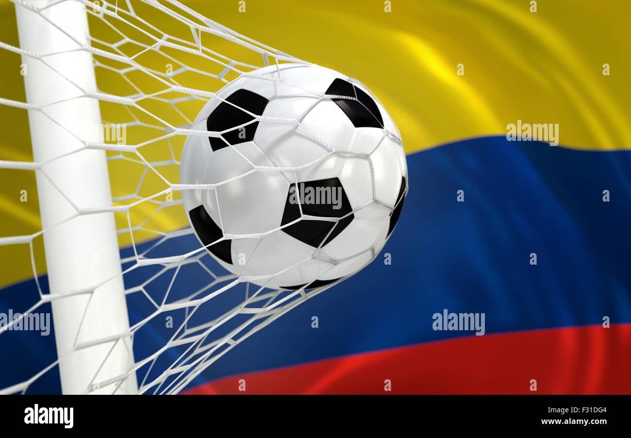Colombia flag and soccer ball, football in goal net Stock Photo - Alamy