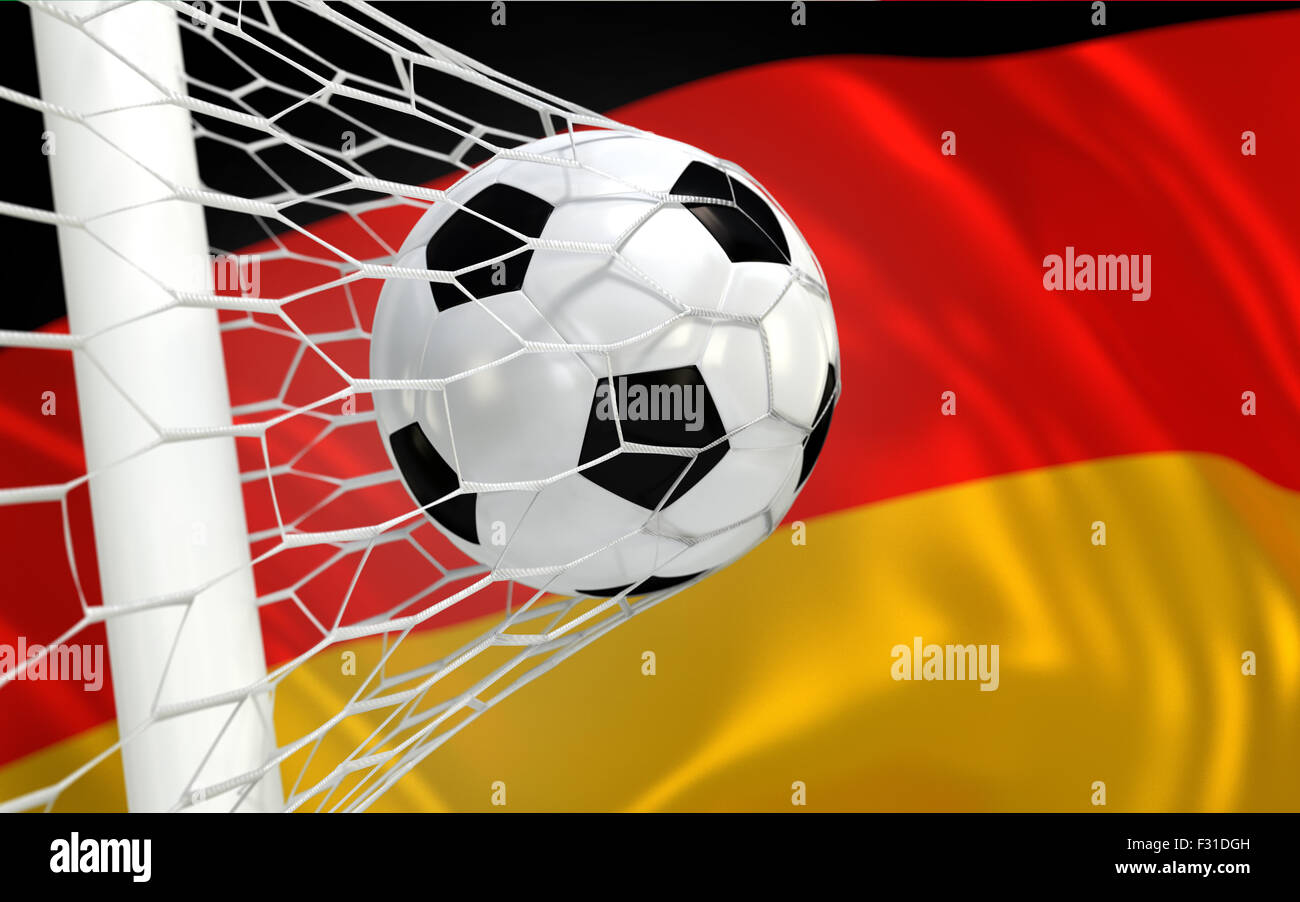 Germany flag and soccer ball, football in goal net Stock Photo - Alamy