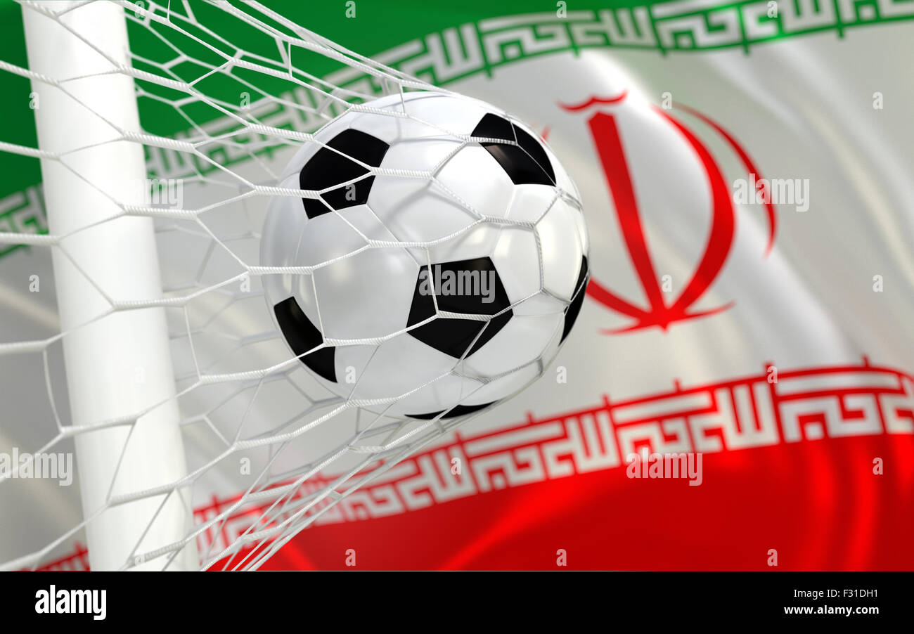 Iran flag and soccer ball, football in goal net Stock Photo - Alamy