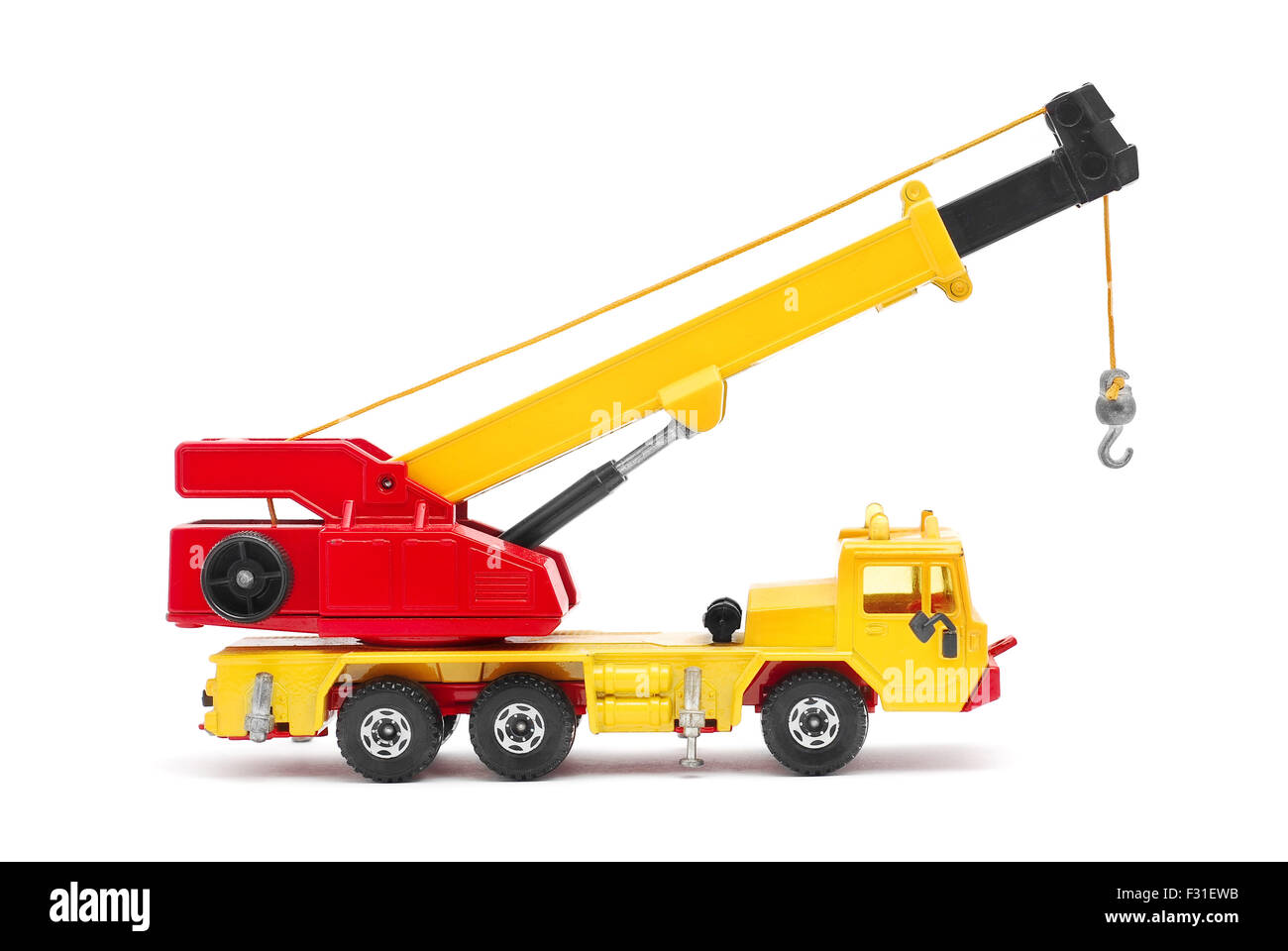 toy crane on white background Stock Photo - Alamy