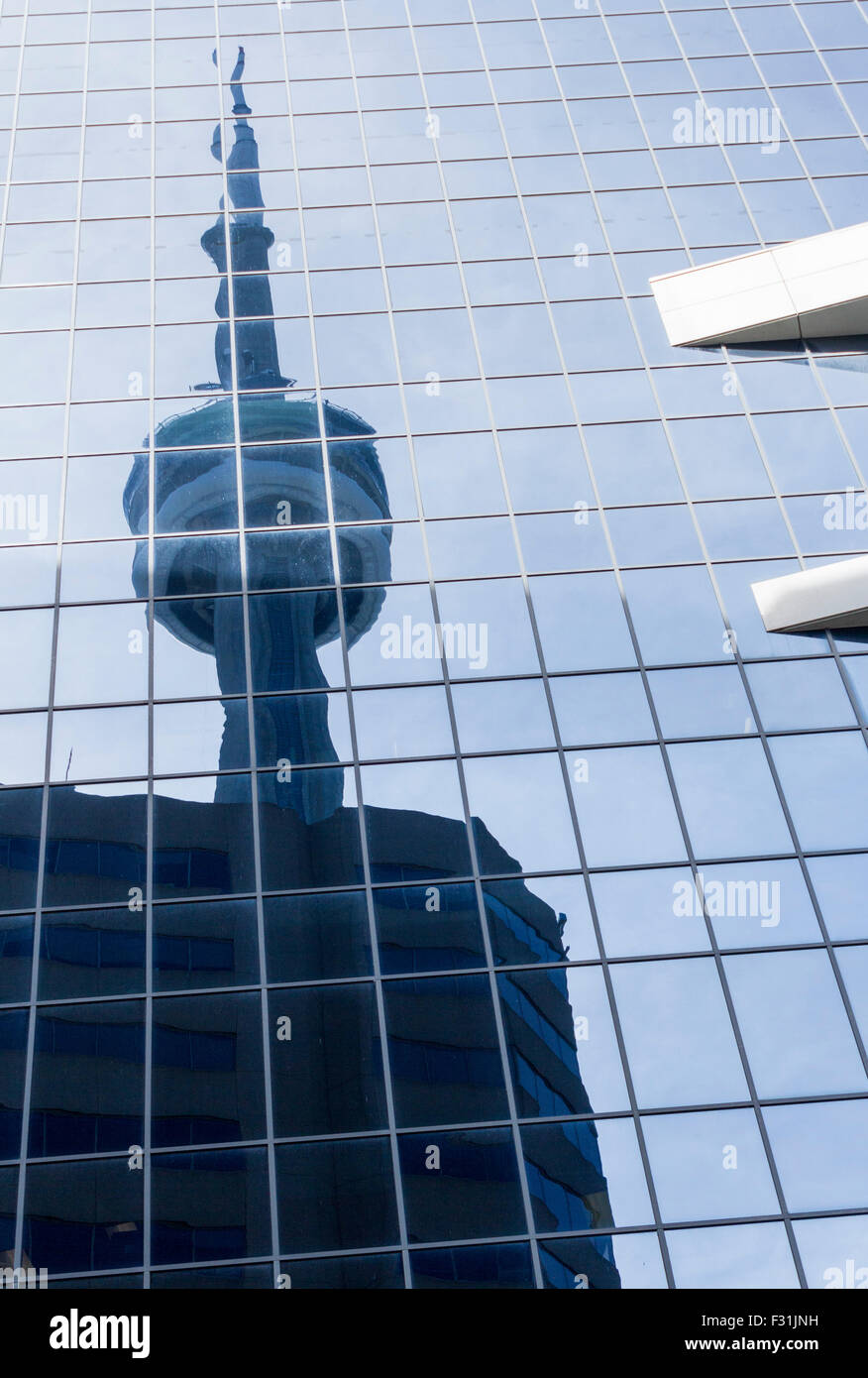 CN Tower reflected in a glass building in Toronto, Ontario, Canada Stock Photo