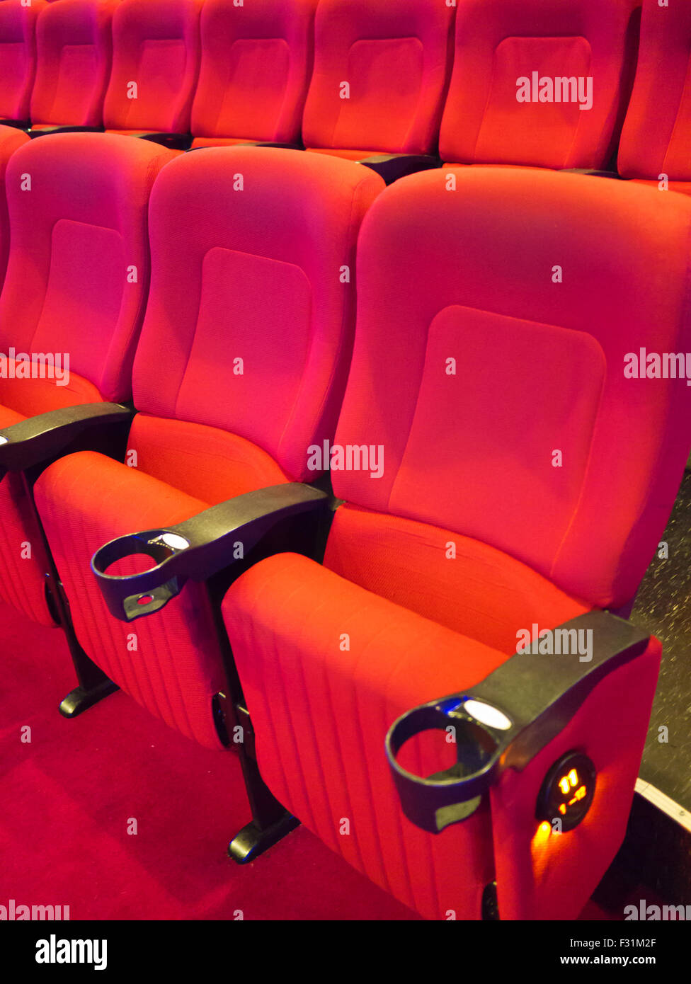 Red auditorium seats hi-res stock photography and images - Alamy