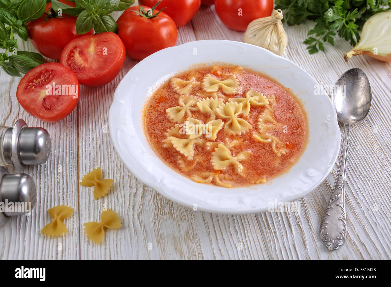 Tomato soup with fresh tomatoes Stock Photo