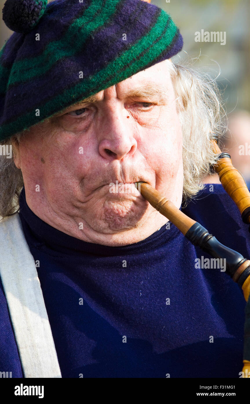 Man playing bagpipes, or Galician gaita, in San Sebastian, Spain Stock Photo