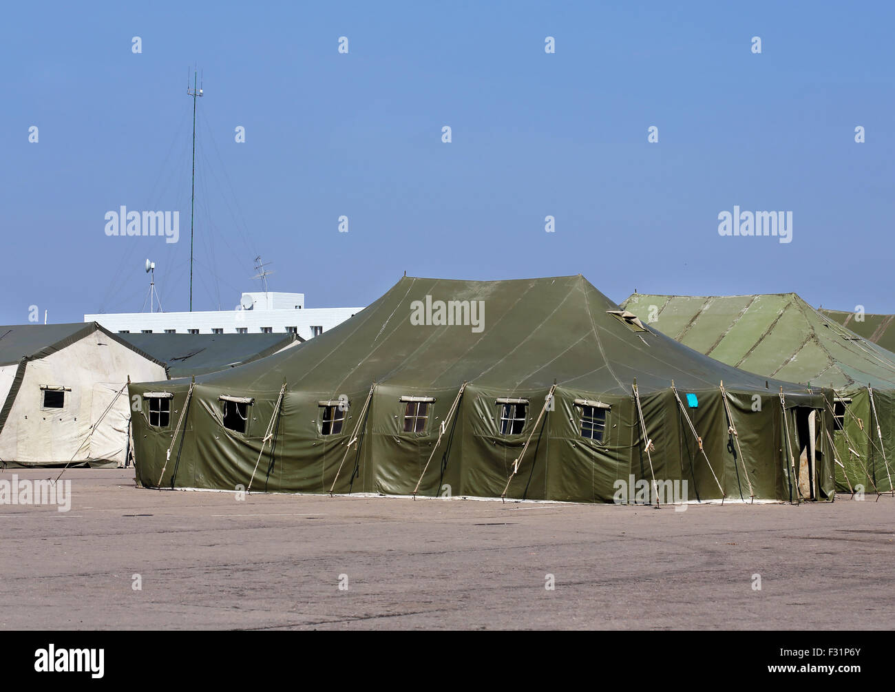 Tents for placement of personnel on military range Stock Photo