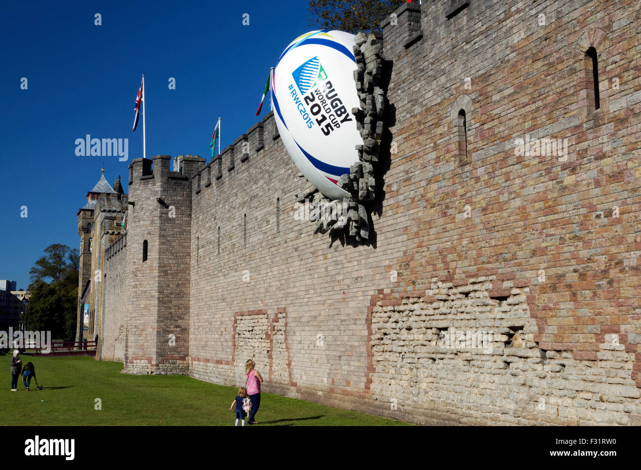 Giant rugby ball crashed into the wall of Cardiff Castle to mark the