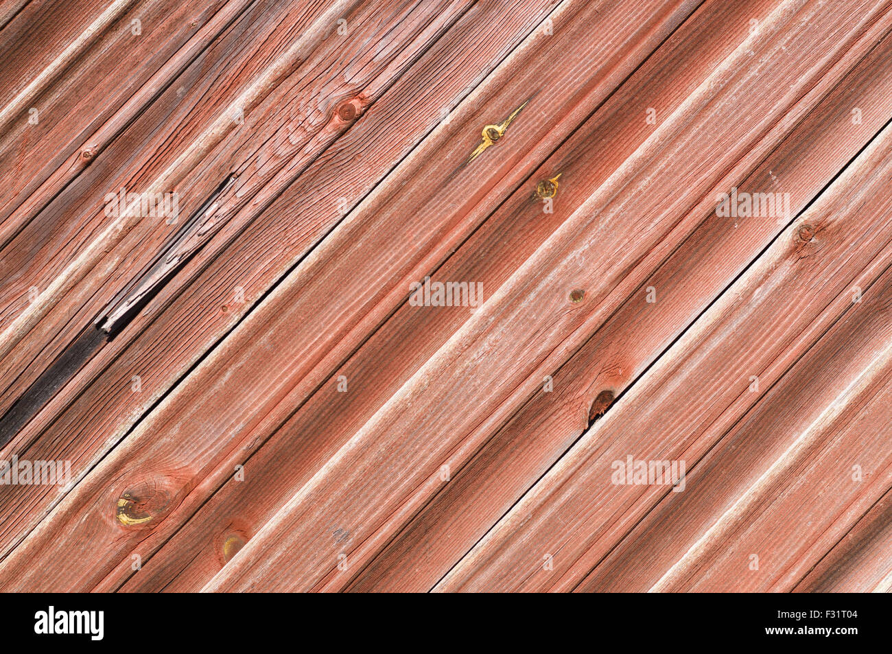 Wooden plank wall painted red, diagonal pattern Stock Photo